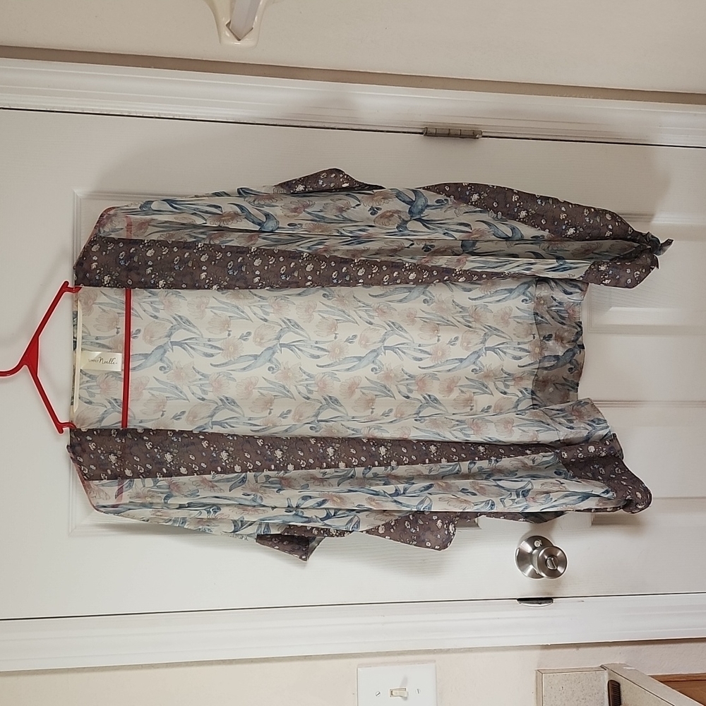 Sheer floral print cover.